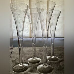4 Polka Dot champagne flutes with hollow stems. 11”H